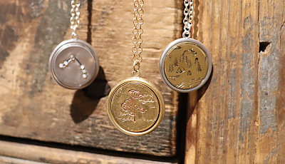 three metal-stamped pendants banner